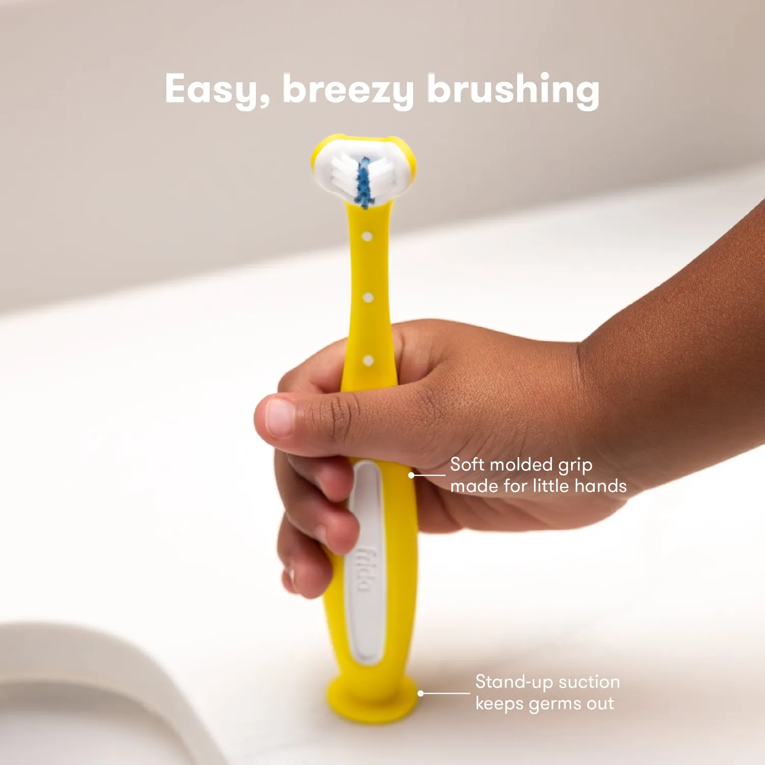 Frida Baby Toothhugger Zahnbürste Gelb 3-seitig
